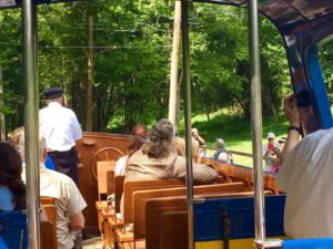 Front end of blue trolley car ride where the commander is driving 
