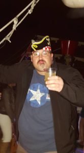 Picture of Jeff in pirate hat holding drink
