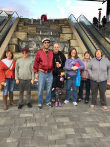 Group photo in front of the fountain. From left to right is Katie, Roland, Michael, Marl, Paige, Natalie, Melissa, and Missy 